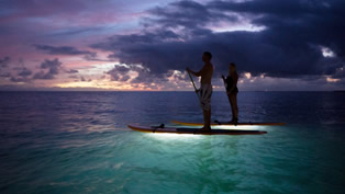 night-paddle-surfing-oahu